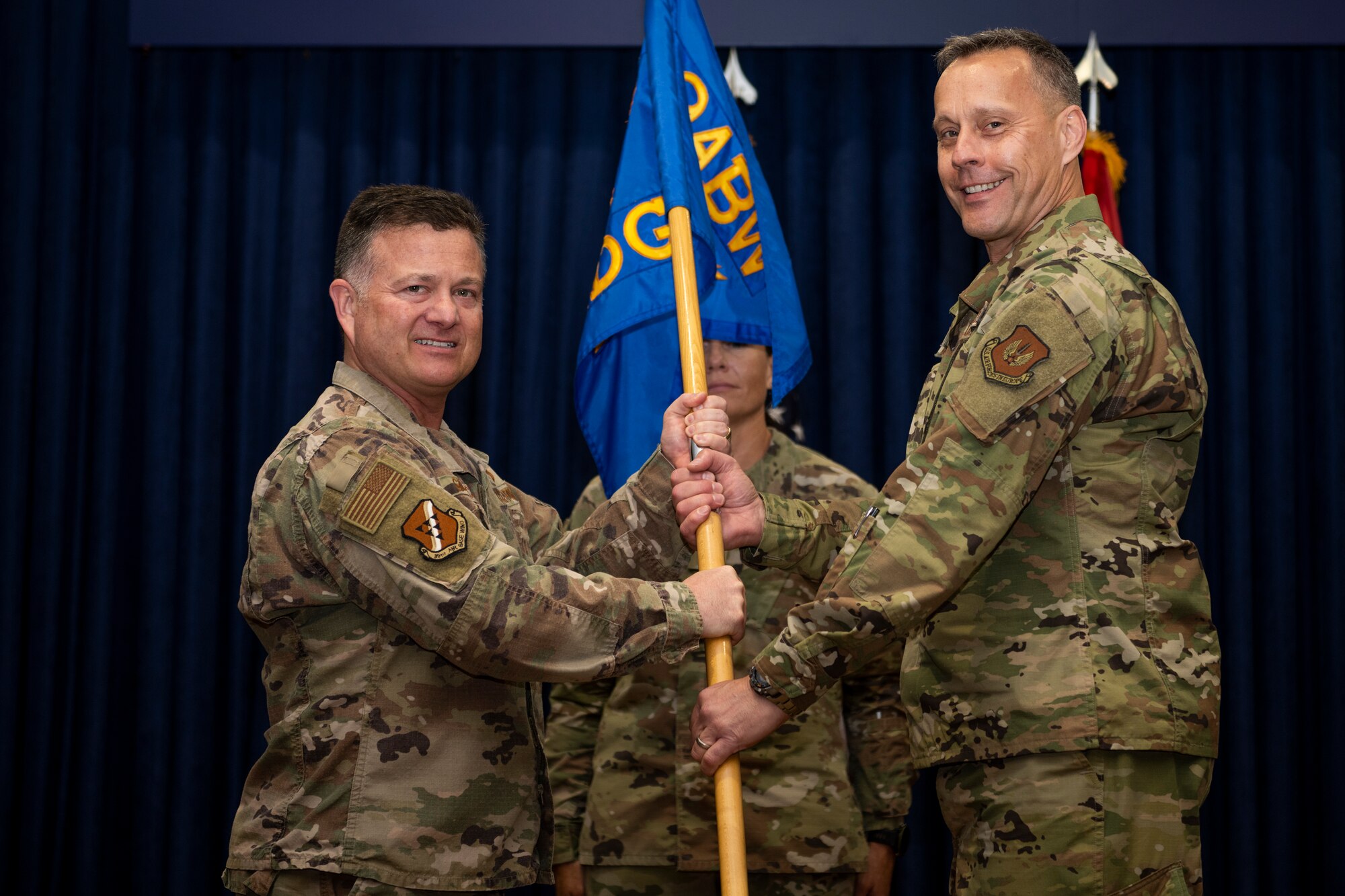 During the ceremony, Col. Bradley Weast relinquished command to Col. Jason Gingrich, 39th Air Base Wing commander, who then charged Col. Scott Carbaugh with leading the group. The change of command ceremony is a long-standing military tradition that represents the formal transfer of responsibility from one officer to another.