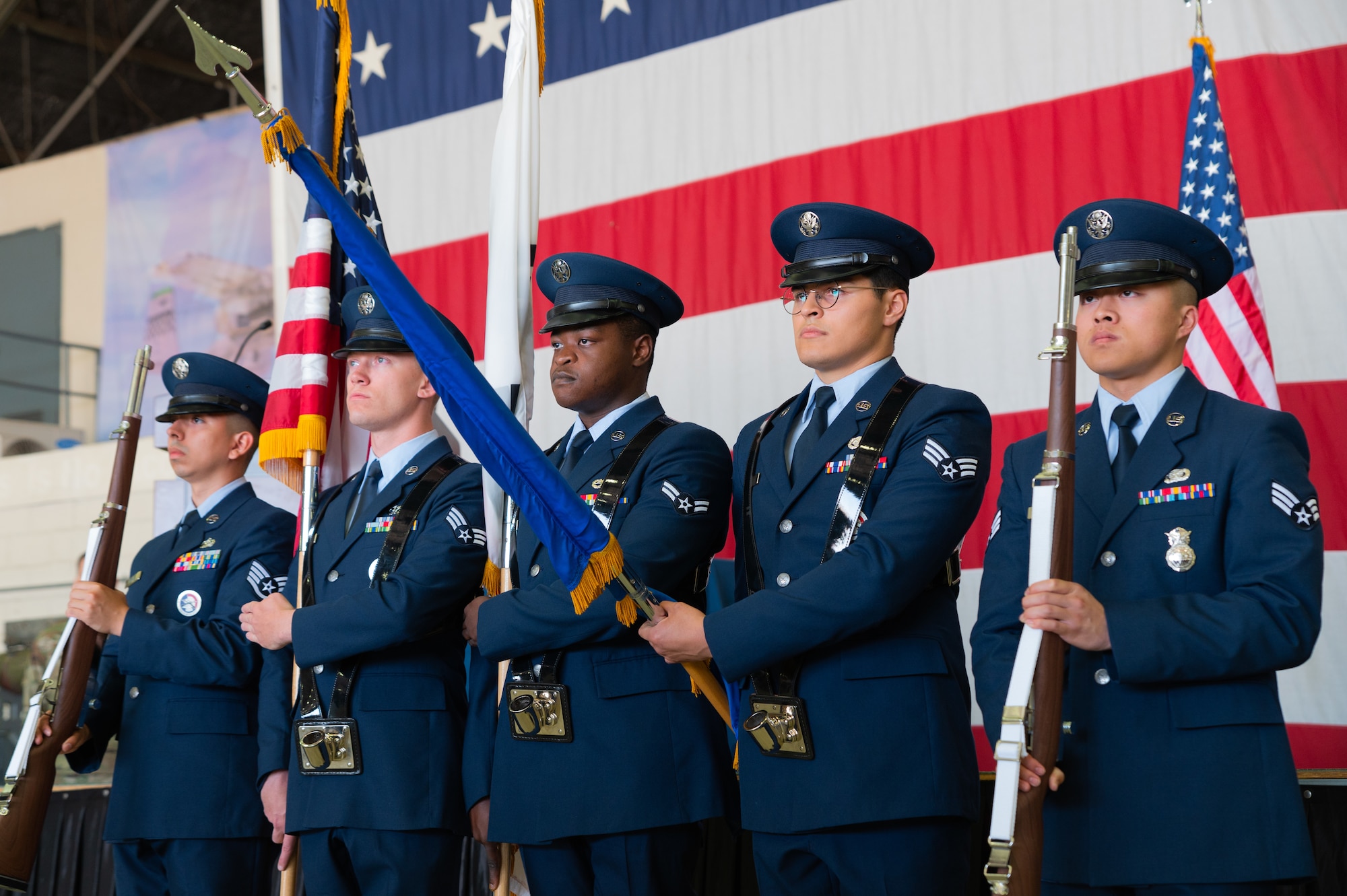 Members of the Osan Honor Guard present the colors during the playing of the U.S. National Anthem