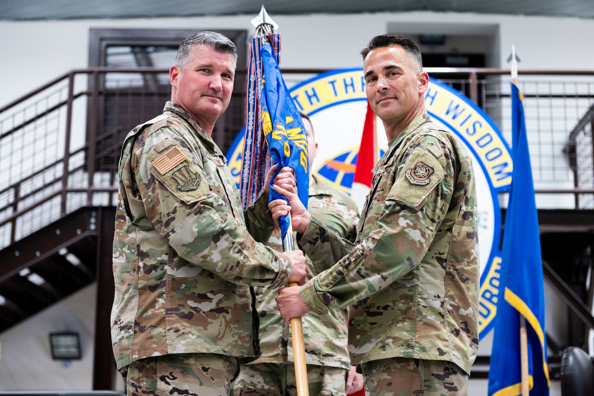 During the ceremony, Lt. Col. Jared Thompson relinquished command to Col. Dawson Brumbelow, 521st Air Mobility Operations Group commander, who then charged Lt. Col. Matthew Bryan with leading the squadron. The change of command ceremony is a long-standing military tradition that represents the formal transfer of responsibility from one officer to another.