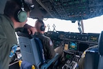 Members from the 124th Fighter Wing, Idaho Air National Guard, travel aboard a C-17 Globemaster III from the 105th Airlift Wing, New York Air National Guard, en route to Alpena, Michigan, June 4, 2022. This effort is in support of Agile Rage 22 exercise.