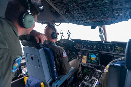 Members from the 124th Fighter Wing, Idaho Air National Guard, travel aboard a C-17 Globemaster III from the 105th Airlift Wing, New York Air National Guard, en route to Alpena, Michigan, June 4, 2022. This effort is in support of Agile Rage 22 exercise.