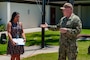 Naval Support Activity Panama City Commanding Officer Cmdr. Keith Foster presented a civilian service achievement medal to Moreina Escobar, June 3.
Escobar was recognized for her performance serving as the housing inspector for all Sailors and civilians who call NSAPC home.
