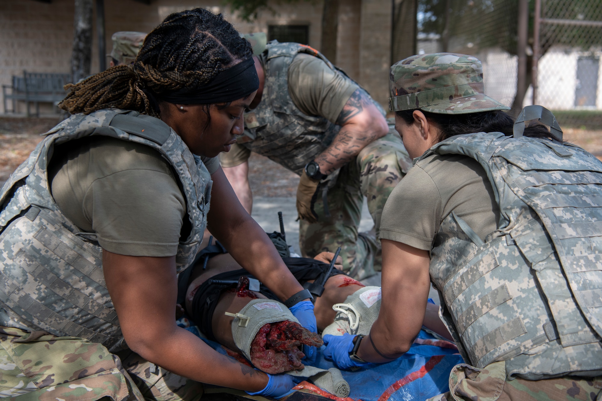 U.S. Air Force Staff Sgt. Donaisha Campbell, a 1st Special Operations Healthcare Operations Squadron UBO manager, applies a tourniquet to a SIM Manikin during a tactical combat casualty care training April 29, 2022, at Hurlburt Field, Florida.