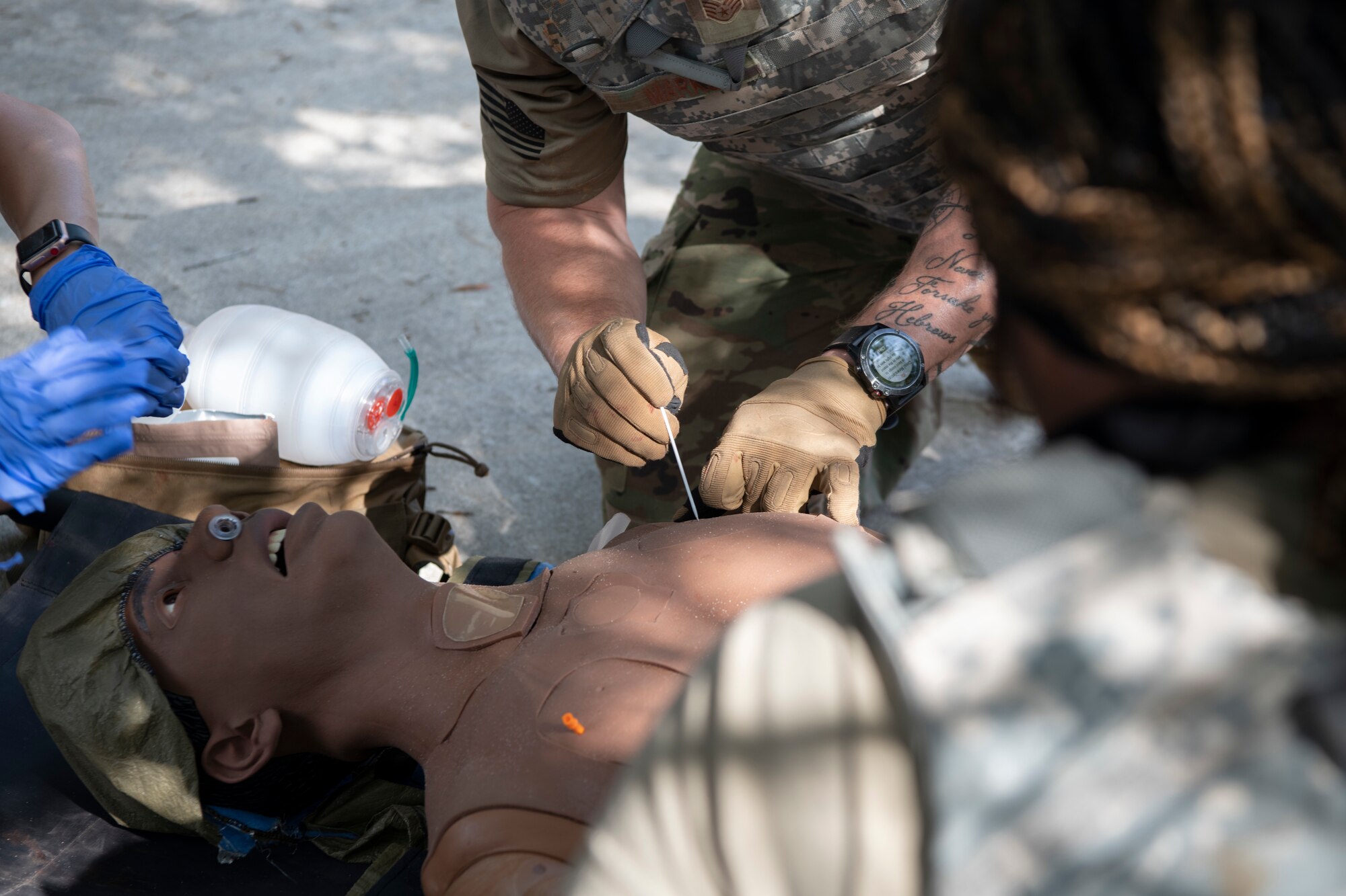 Air Commandos with the 1st Special Operations Healthcare Operations Squadron and the 1st Special Operations Medical Group conducts a needle decompression on a SIM manikin during a tactical combat casualty care training April 29, 2022, at Hurlburt Field, Florida.