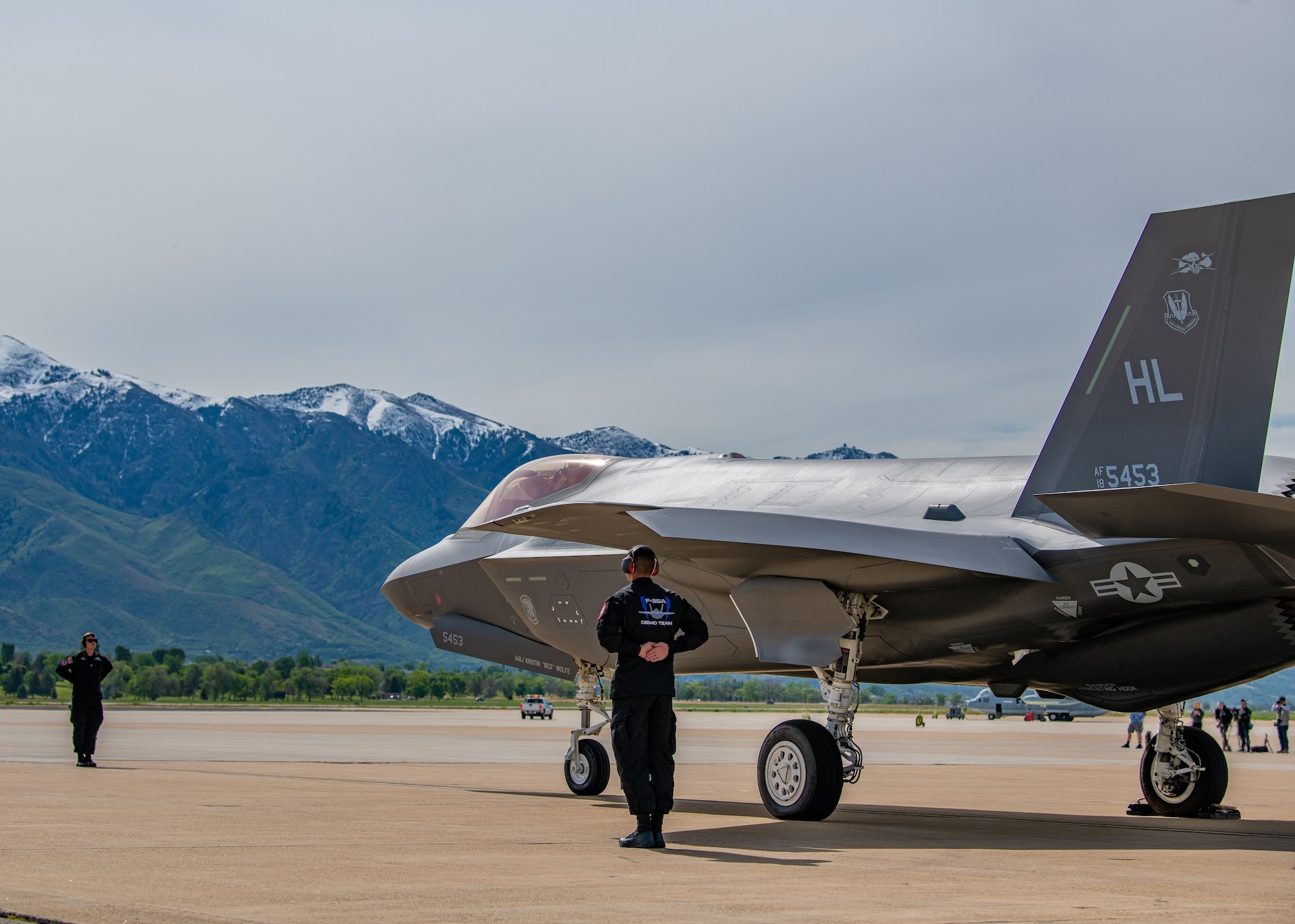 Senior Airman Aaron Welch, left, and Staff Sgt. Zach Stiles, both F-35A Lightning II Demonstration Team avionics specialist, prepare to launch out Major Kristin Wolfe, team pilot and commander, for a demonstration flight over Hill Air Force Base, Utah, June 3rd, 2022, before the Wings over the Wasatch Air Show held on base later this month. The 2022 air show will be the first in four years, with the 2020 show being cancelled. (U.S. Air Force photo by Staff Sgt. Codie Trimble)