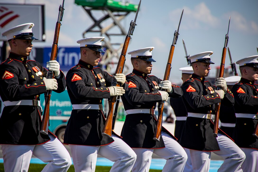 Marines with the Silent Drill Platoon perform at the pre-race ceremony during the Coca-Cola 600 at Charlotte Motor Speedway in Concord, N.C., May 28, 2022.