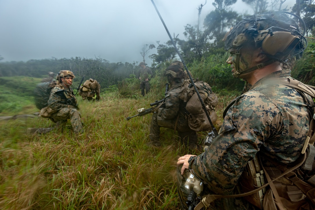 U.S. Marines with 3rd Battalion, 2nd Marines, secure a landing zone during Counter Assault Exercise on Okinawa, Japan, May 11, 2022. During this force-on-force exercise, an infantry company with 3/2 rapidly deployed into the double-canopy jungles of the Northern Training Area to defend against an assault from another infantry company with 1st Battalion, 3rd Marines. This exercise was designed to increase 3rd Marine Division’s ability to seize and defend key maritime terrain, such as islands or coastal areas, and conduct Expeditionary Advanced Base Operations in the western Pacific. 3/2 is deployed under 4th Marines, 3rd Marine Division as part of the Unit Deployment Program.