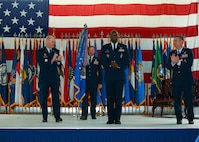 Col. Kenneth McGhee, incoming 91st Missile Wing commander, takes command of the 91st Missile Wing at Minot Air Force Base, North Dakota, June 06, 2022. Consisting of three groups, the 91st Operations Group, 91st Maintenance Group and 91st Security Forces Group, the 91st Missile Wing has approximately 1,800 professionals working together to keep Minuteman missiles on alert. (U.S. Air Force photo by Airman 1st Class Evan J. Lichtenhan)