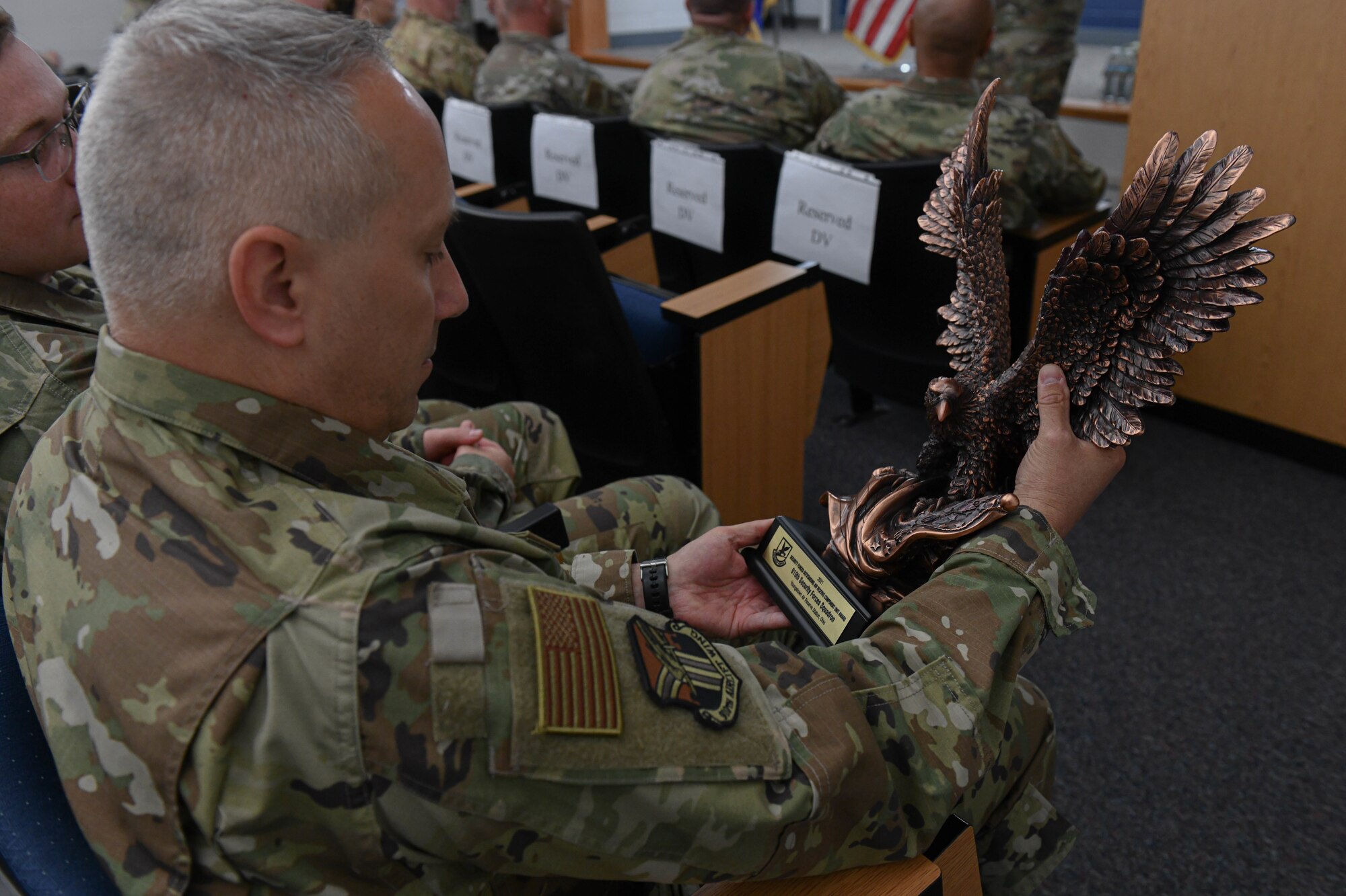 Brig. Gen. Roy W. Collins, director of security forces, Headquarters U.S. Air Force, visited the 910th SFS during the June UTA to present a trophy commemorating the unit being named the security forces outstanding Air Reserve component of the year for 2021 and observe the unit’s operations.