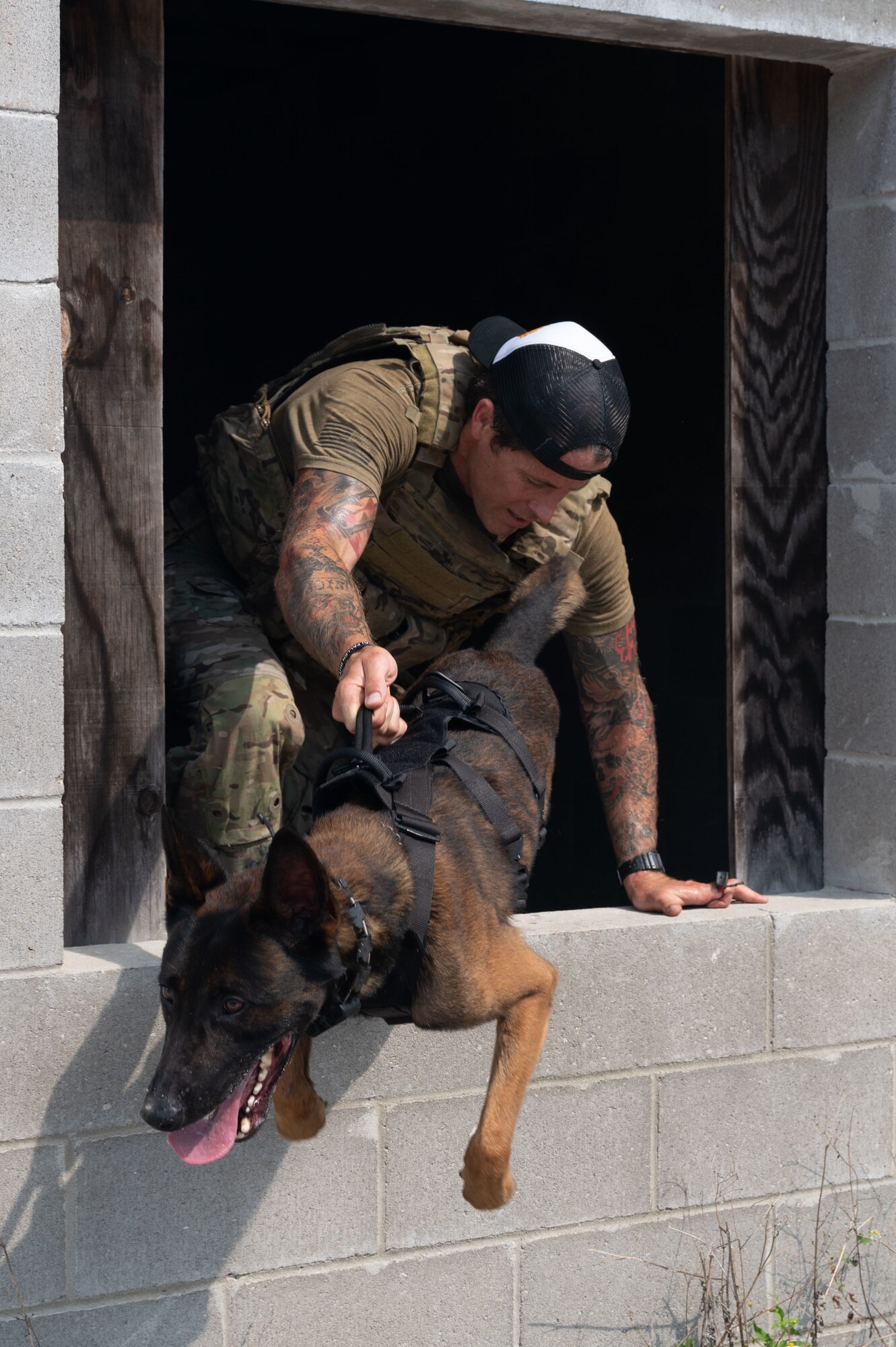 U.S. Army Military Working Dog Handler with the 7th special forces group, competes in a K9 competition during National Police Week on May 18, 2022, at Eglin Air Force Base.