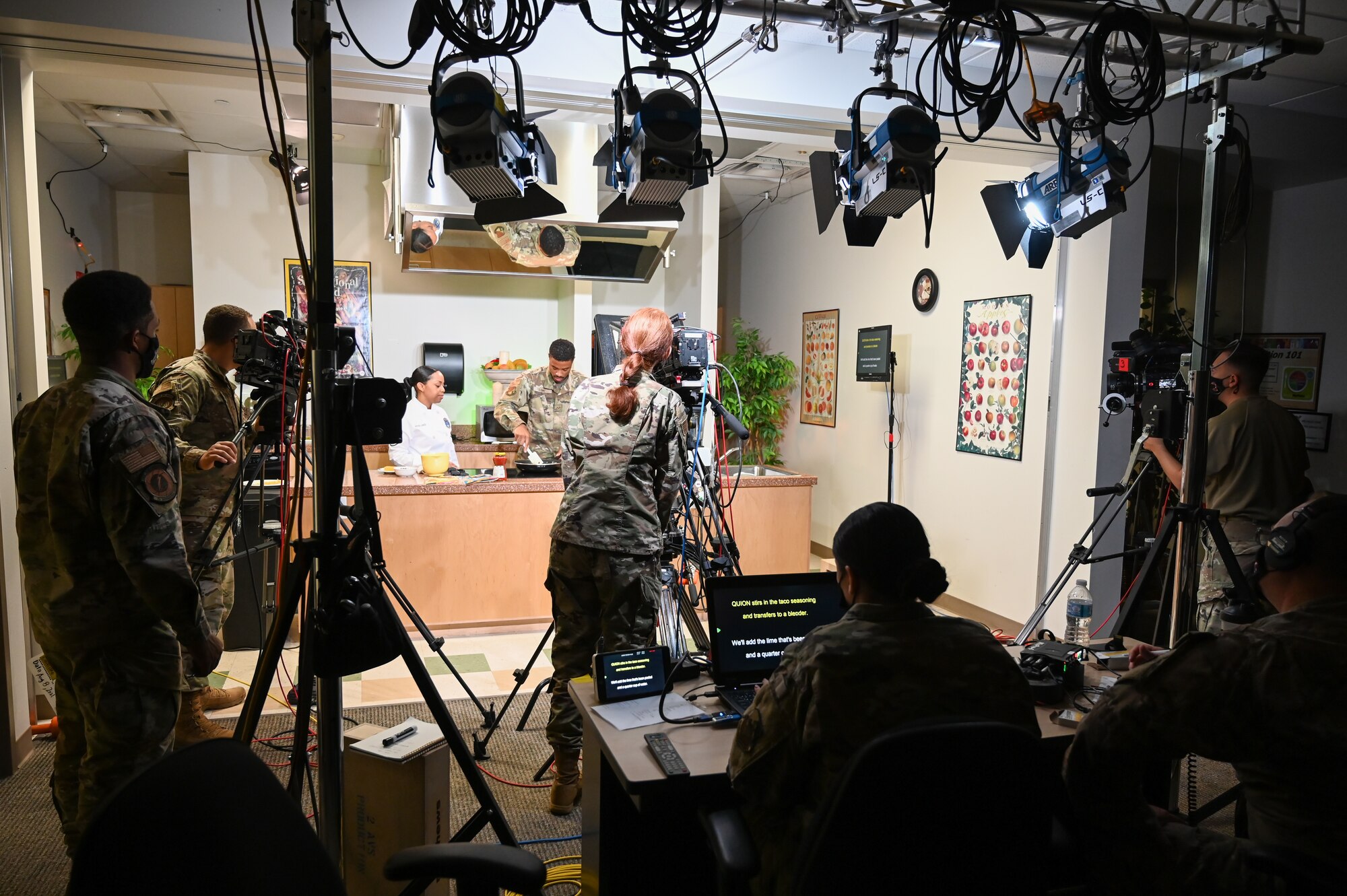 Members from the 2d Audiovisual Squadron film a Nutrition Kitchen series Aug. 9, 2021, at Hill Air Force Base, Utah. 2d AVS is producing the series for the Air Force Surgeon General about making healthy cooking choices and the science behind those choices.