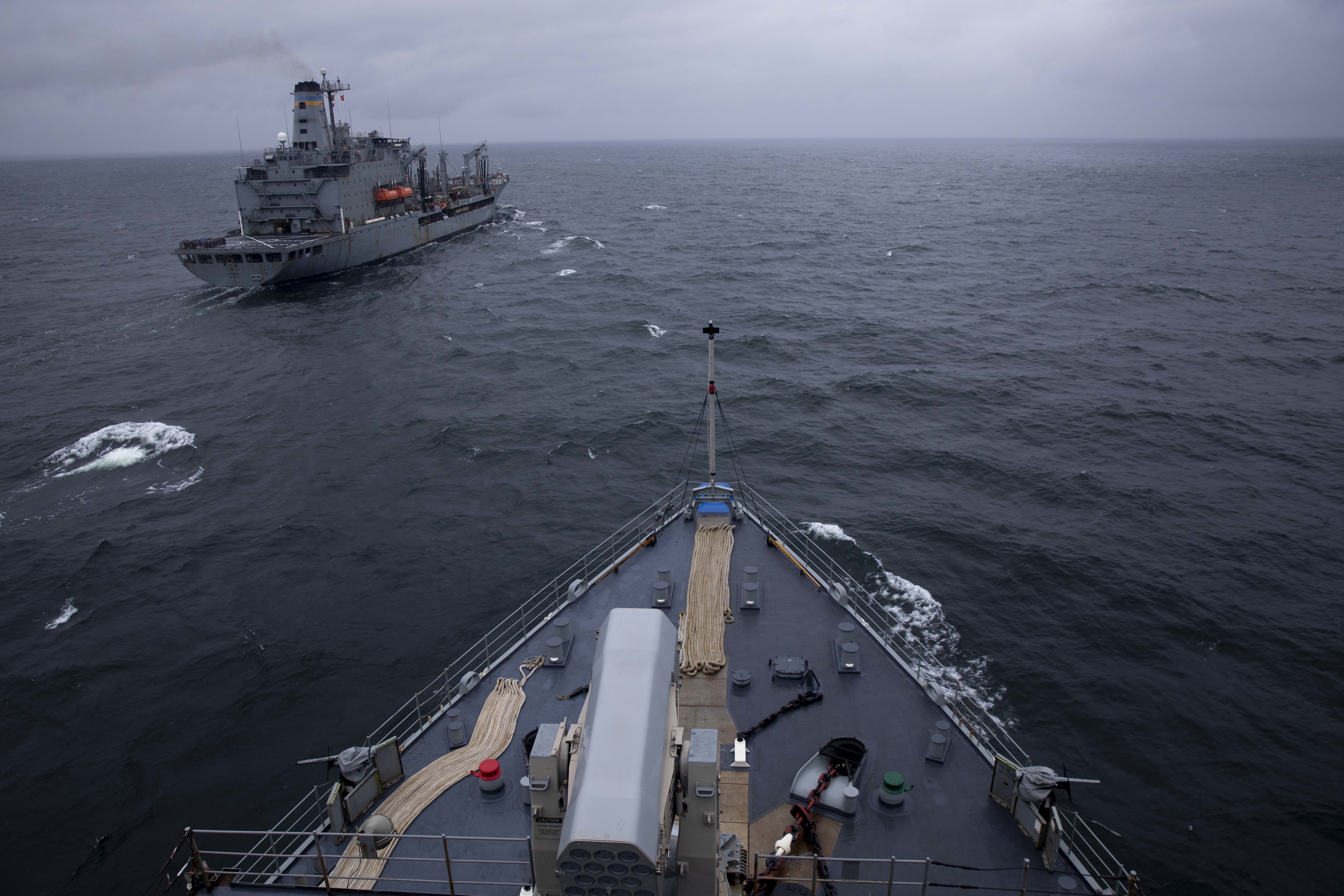 The Whidbey Island-class dock landing ship USS Gunston Hall (LSD 44) pulls alongside the Military Sealift Command Henry J. Kaiser-class underway replenishment oiler USNS Patuxent (T-AO-201), May 31, 2022.