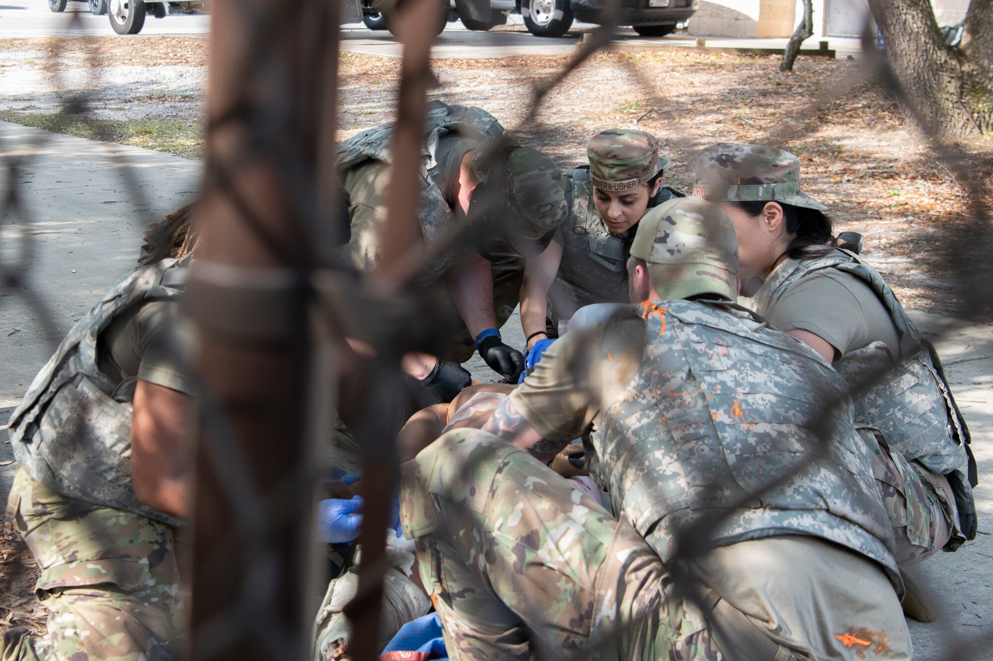 Air Commandos with the 1st Special Operations Healthcare Operations Squadron and the 1st Special Operations Medical Group perform medical care on a SIM Manikin during tactical combat casualty care training April 29, 2022, at Hurlburt Field, Florida.