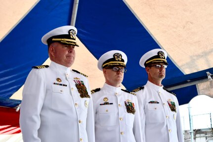 The guided-missile destroyer USS Oscar Austin (DDG 79) held its change of command ceremony aboard the ship, June 3, 2022. Cmdr. Bryan Wolfe relieved Cmdr. Matthew Krull during the time-honored ceremony, which was presided over by Rear Adm. Brendan McLane, commander, Naval Surface Force Atlantic (SURFLANT).