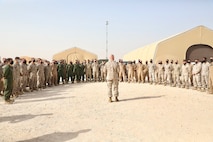 U.S. Marine Corps Maj. Gen. Paul Rock, Commander, U.S. Marine Corps Forces Central Command speaks with Marines with Marine Fighter Attack Squadron 115 (VMFA-115) during his visit to Prince Sultan Air Base, Kingdom of Saudi Arabia on Feb. 27, 2022. VMFA-115 has been deployed to Prince Sultan Air Base in the Kingdom of Saudi Arabia since December 2021 and are an integral part of the Immediate Response Force in the Central Command area of responsibility.