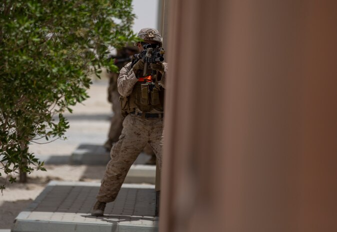 BAHRAIN (May 18, 2022) – U.S. Marines assigned to Fleet Anti-Terrorism Security Team Central Command (FASTCENT) conduct squad level training during exercise Neon Defender 22 in Bahrain, May 18. Neon Defender is an annual bilateral training event between U.S. Naval Forces Central Command and Bahrain. The exercise focuses on maritime security operations, installation defense and medical response. (U.S. Marine Corps photo by Sgt. Benjamin McDonald)