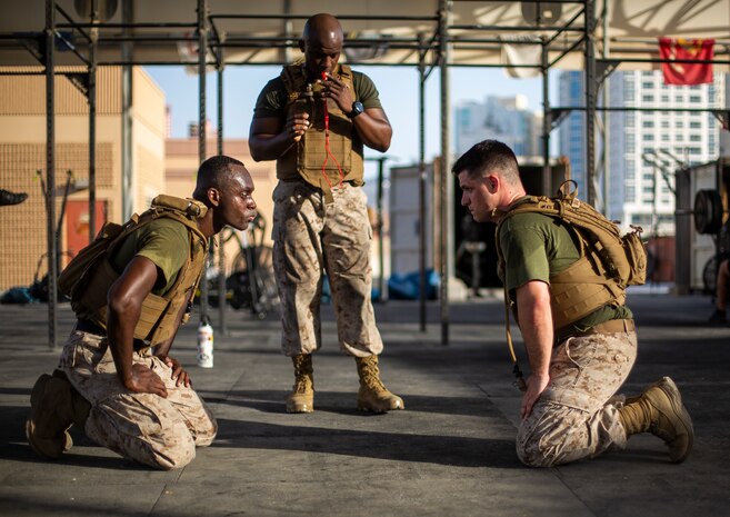 NAVAL SUPPORT ACTIVITY, Bahrain (June 01, 2022) – Marines assigned to Task Force 51/5th Marine Expeditionary Brigade (TF 51/5) completed the Marine Corps Martial Arts Program (MCMAP) black belt culminating event aboard Naval Support Activity, Bahrain, June 01.  The culminating event included various exercise stations and sparring matches where Marines used techniques learned throughout their MCMAP training. TF 51/5 responds to crises and contingencies; coordinates, plans, and executes operations; conducts theater security cooperation; and advances emerging Naval concepts at sea, from the sea, and ashore in order to support U.S. Central Command, 5th Fleet, and Marine Corps Forces Central Command theater objectives. (U.S. Marine Corps photo by Sgt. Benjamin McDonald)