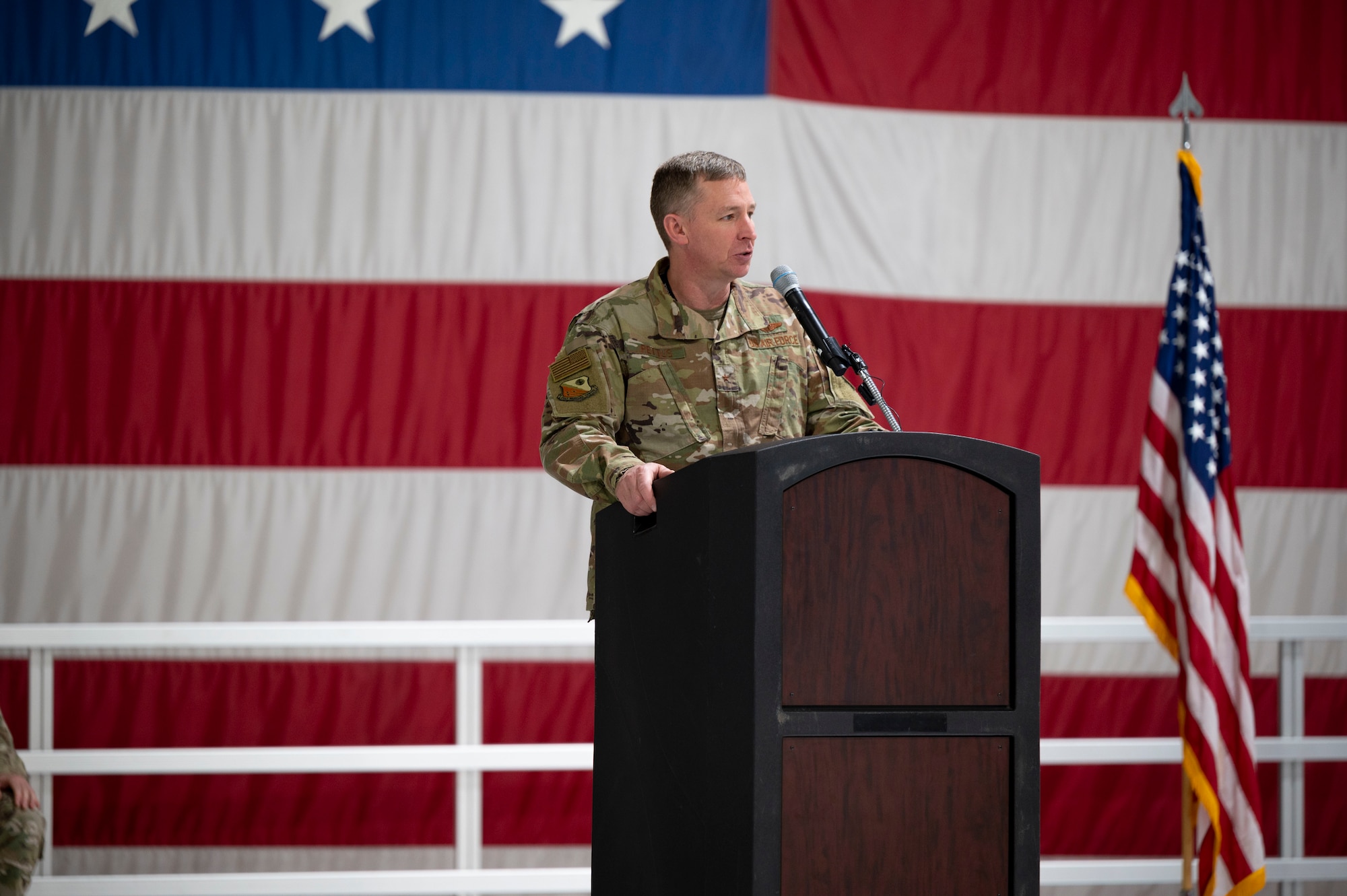 man at podium