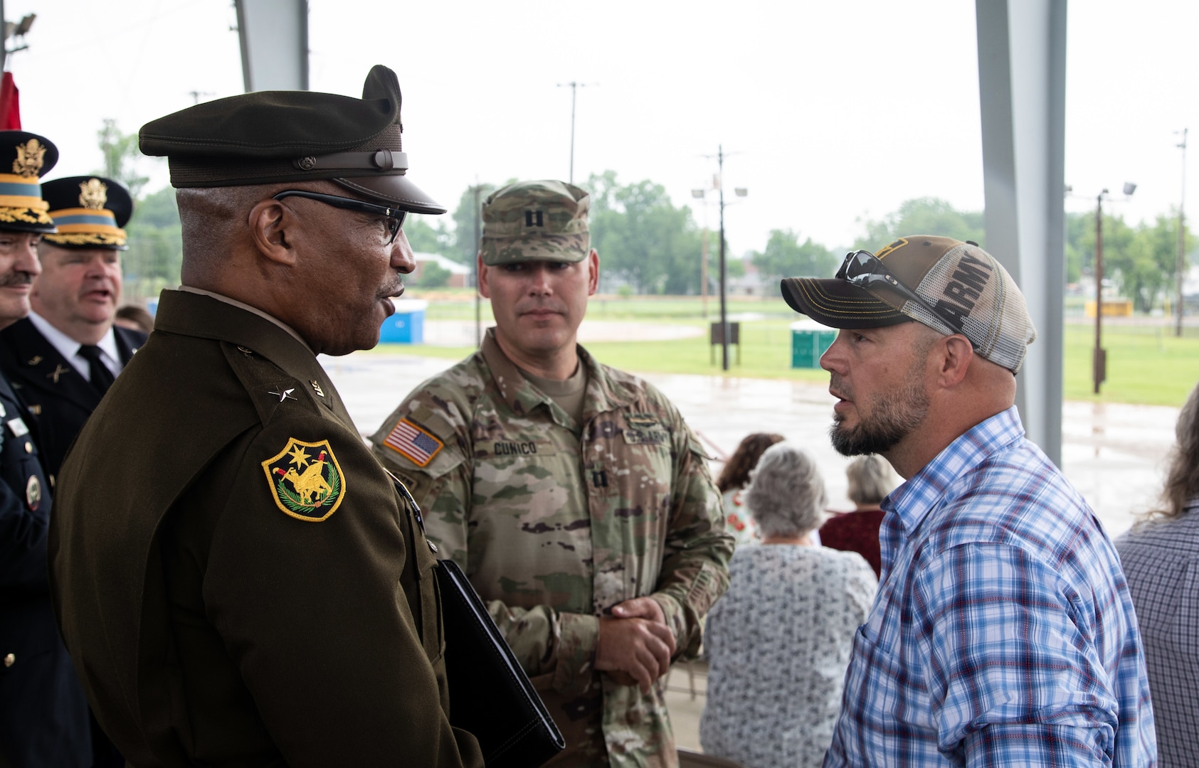Brig. Gen. Rodney Boyd, of Naperville, Illinois, Assistant Adjutant General – Army and Commander of the Illinois Army National Guard, talks with former Illinois Army National Guard Soldier Randall Romines, brother of Sgt. Brian Romines, following the Sgt. Brian Romines Memorial Highway dedication ceremony, June 6, in Anna, Illinois.