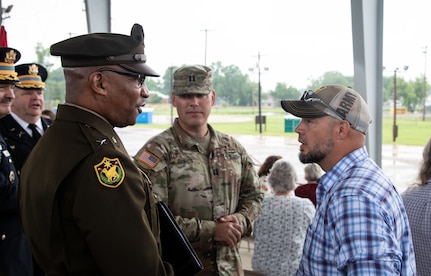 Brig. Gen. Rodney Boyd, of Naperville, Illinois, Assistant Adjutant General – Army and Commander of the Illinois Army National Guard, talks with former Illinois Army National Guard Soldier Randall Romines, brother of Sgt. Brian Romines, following the Sgt. Brian Romines Memorial Highway dedication ceremony, June 6, in Anna, Illinois.