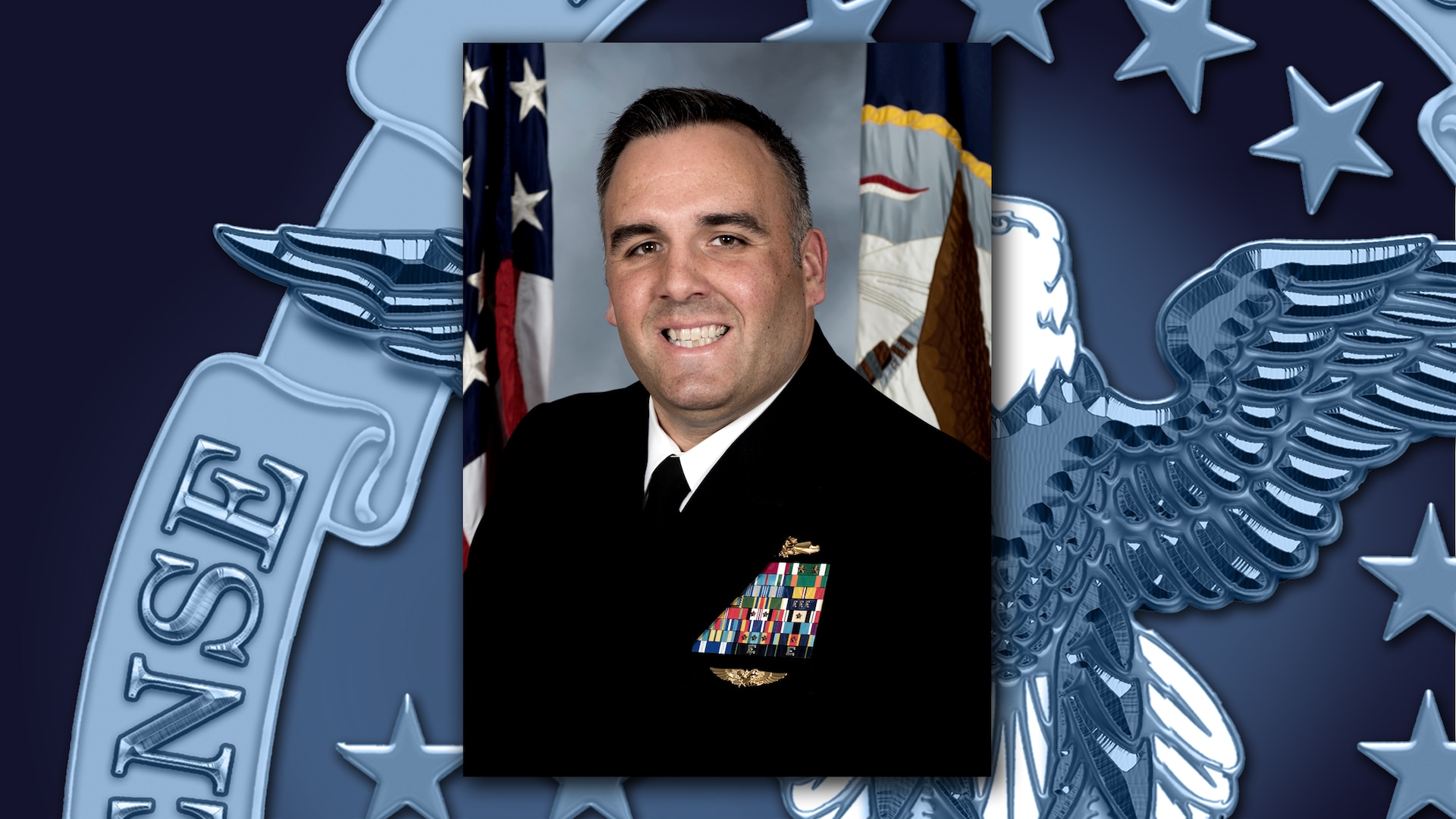 Portrait of Navy Lt. Cmdr. Hugh Wilson on DLA background.