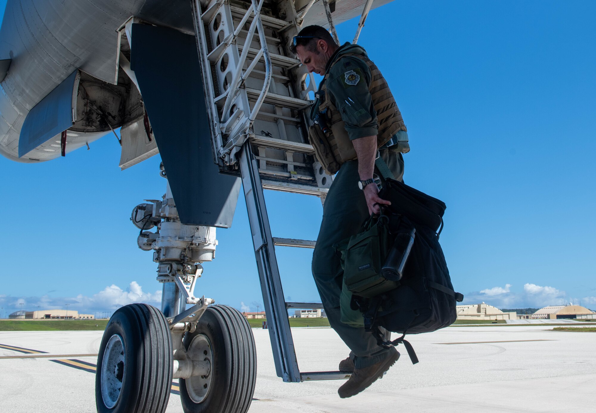 U.S. Air Force Lt. Col. Ross Hobbs, the commander of the 34th Bomb Squadron, exits a B-1B Lancer on Andersen Air Force Base, Guam, after landing for a Bomber Task Force mission on June 2, 2022.