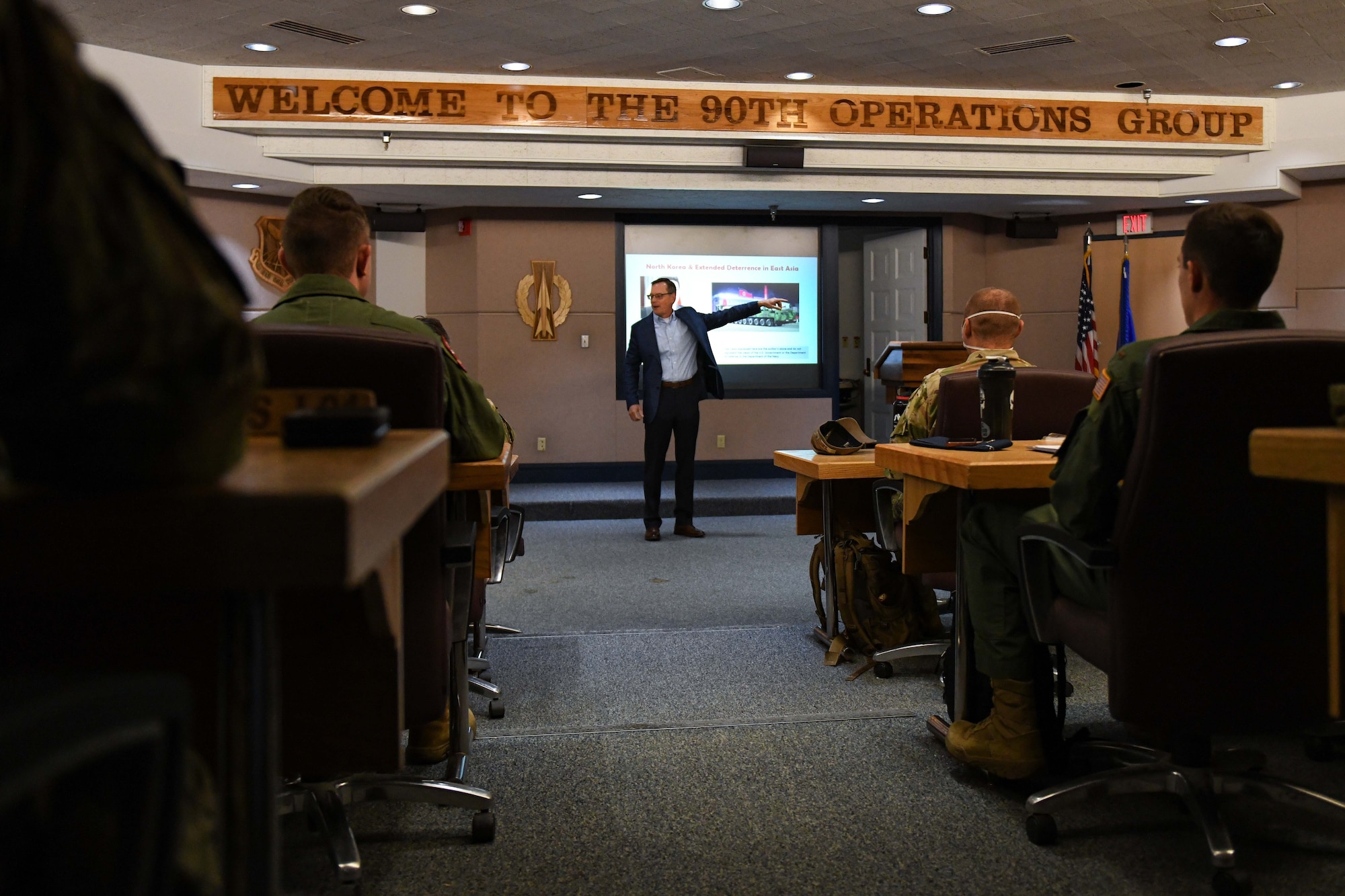 A person gives a brief.