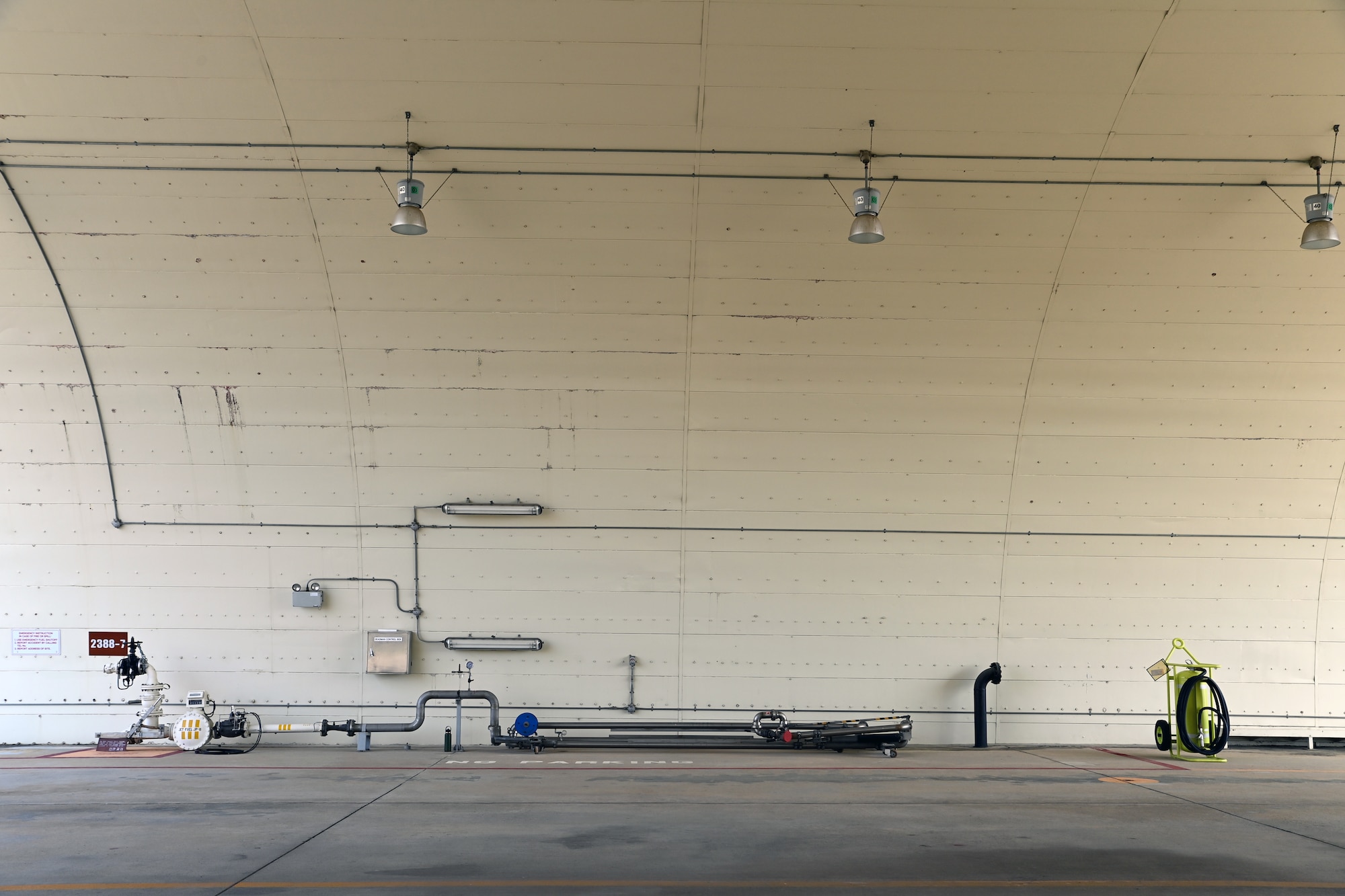 A pantograph fueling system stands ready for use at Suwon Air Base, Republic of Korea, June 2, 2022. A pantograph is an articulating arm located inside of a flow-through revetment connected to a series of underground piping, which is ultimately connected to a fuel tank. (U.S. Air Force photo by Master Sgt. Rachelle Morris)