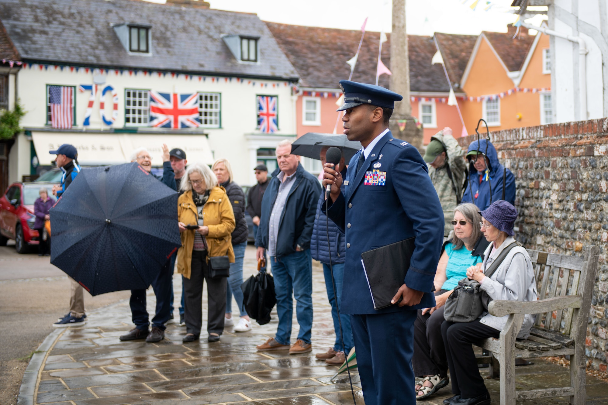 Capt. Damien Gipson, 352d Special Operations Wing chaplain, speaks to the Lavenham community during the remembrance ceremony held in Langham Market Place, England, May 29, 2022.