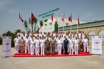 (June 3, 2022) Military members from the twelve nations that participated in exercise Phoenix Express 2022 pose for a group photo after the closing ceremony to mark the successful completion of the multinational maritime exercise in Tunis, Tunisia, June 3 2022. Phoenix Express 22, conducted by U.S. Naval Forces Africa, is a maritime exercise designed to improve cooperation among participating nations in order to increase maritime safety and security in the Mediterranean.