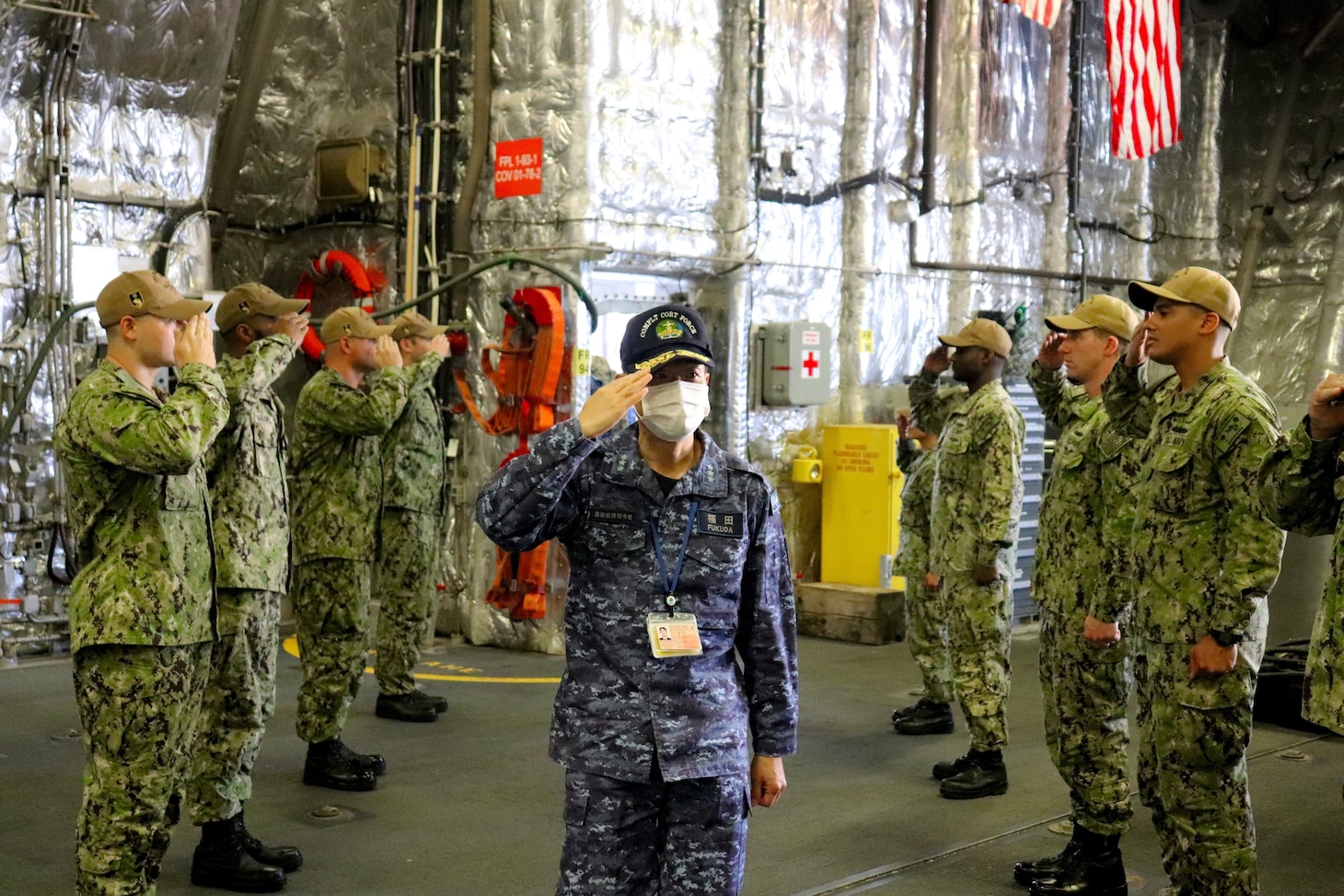 SASEBO, Japan (June 1, 2022) Japan Maritime Self-Defense Force Vice Adm. FUKUDA Tatsuya, commander, Fleet Escort Force, arrives aboard the Independence-class littoral combat ship USS Charleston (LCS 18). Charleston, part of Destroyer Squadron (DESRON) 7, is on a rotational deployment, operating in the U.S. 7th Fleet area of operations to enhance interoperability with partners and serve as a ready-response force in support of a free and open Indo-Pacific region. (U.S. Navy photo by Lt. j.g. James French)