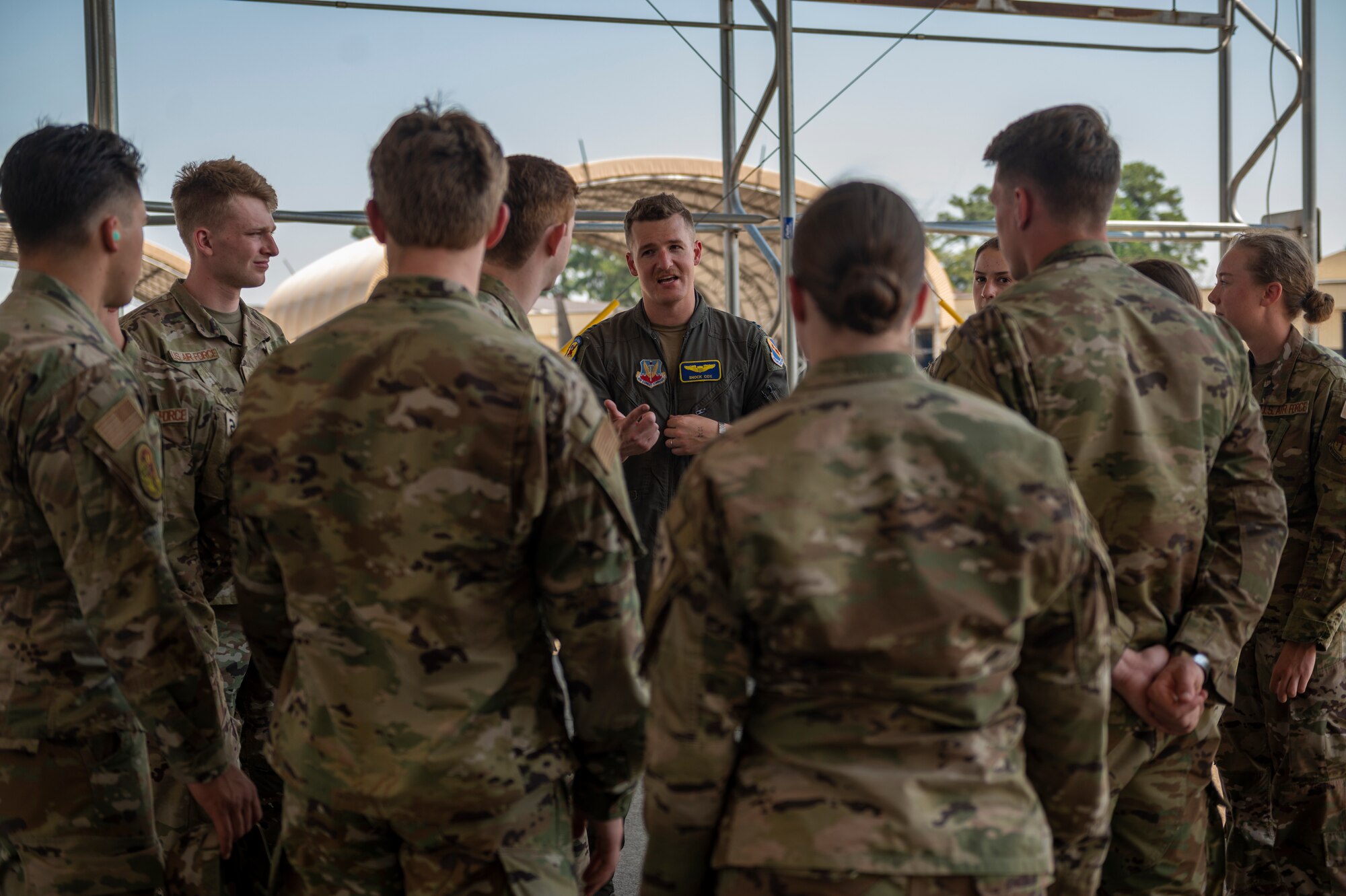 Cox explained the mission and responsibilities of an F-15E Strike Eagle fighter pilot as part of an F-15E tour for the cadets. (U.S. Air Force photo by Senior Airman Kylie Barrow)