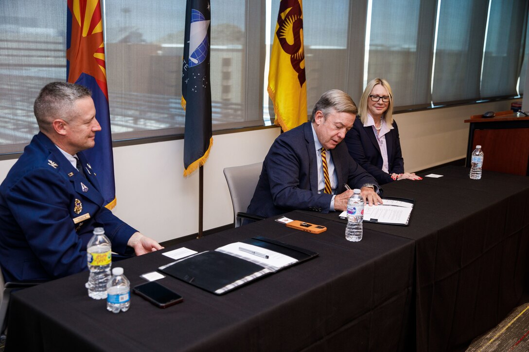 Dr. Lisa Costa, Space Force Chief Technology and Innovation Officer, joins Arizona State University President Michael M. Crow to finalize the University Partnership Program agreement in Tempe, Ariz., June 7, 2022. During her visit, she also learned more about ASU's space initiatives and capabilities.