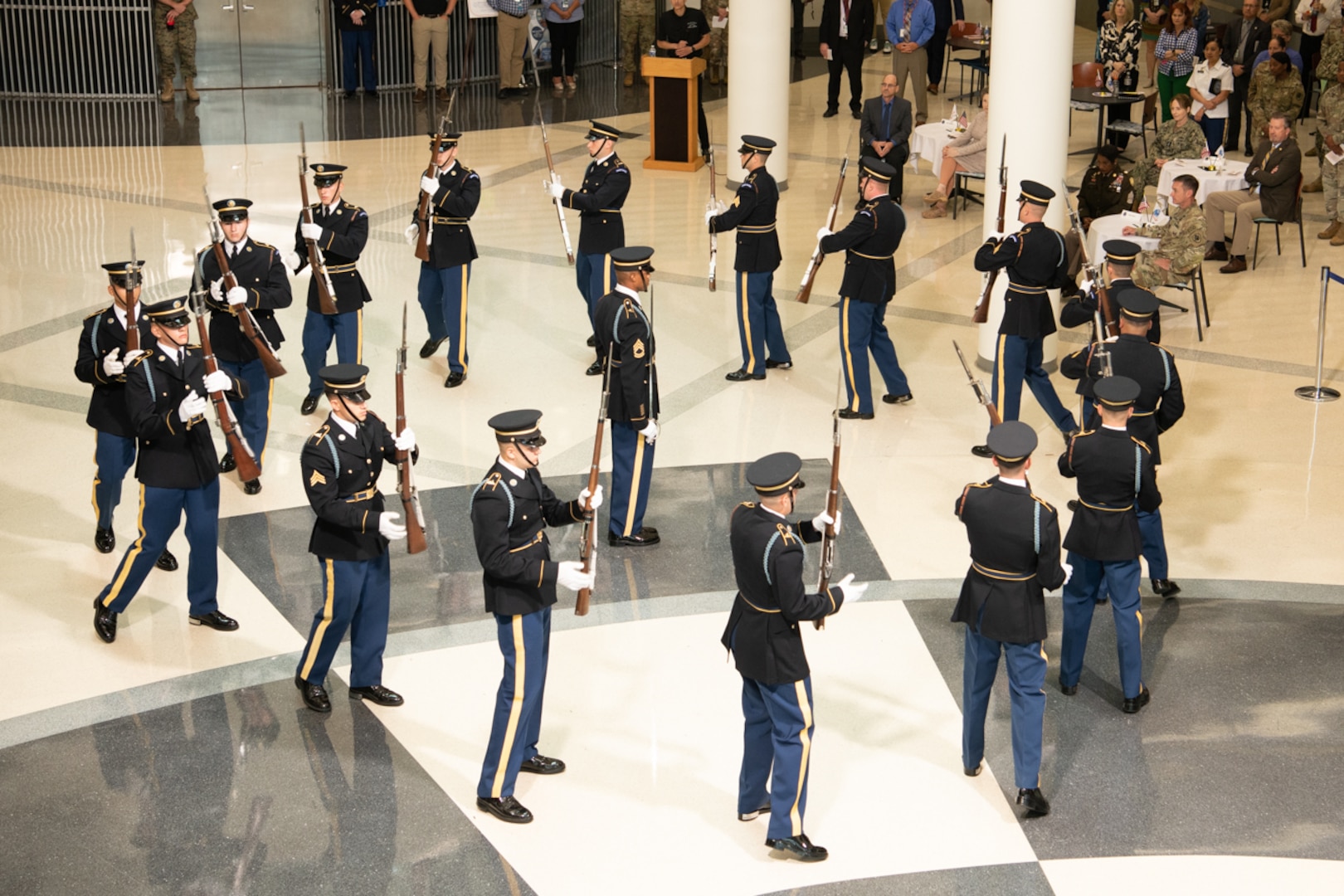 U.S. Army Drill Team demonstrated their skills in the cafeteria following the U.S. Army birthday celebration June 7 in the McNamara Headquarters Complex, Fort Belvoir, Virginia. Photo by Christopher Lynch