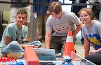 IMAGE: Members of the King George High School robotics team eye the clock as their time runs out during the Innovation Challenge @Dahlgren. The Foxes fielded three separate teams during the event that took place April 29-30 at the University of Mary Washington Dahlgren Campus.