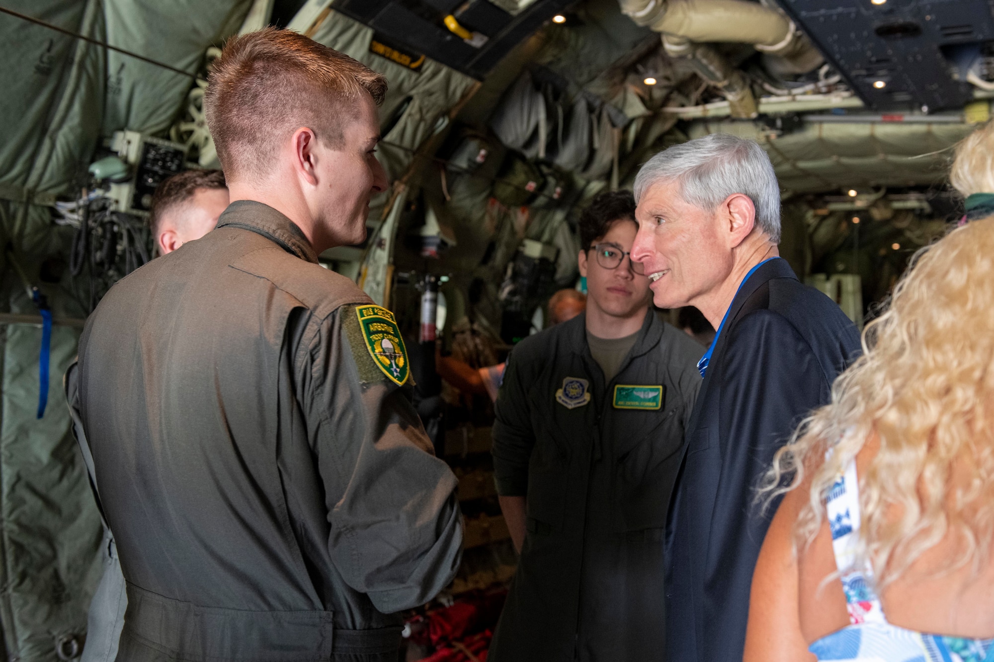 Former Air Force Chief of Staff Gen. (ret.) Norton Schwartz, a former member of the 61st Tactical Airlift Squadron from 1977 to 1979, speaks with Airmen assigned to the 61st Airlift Squadron during a reunion visit
