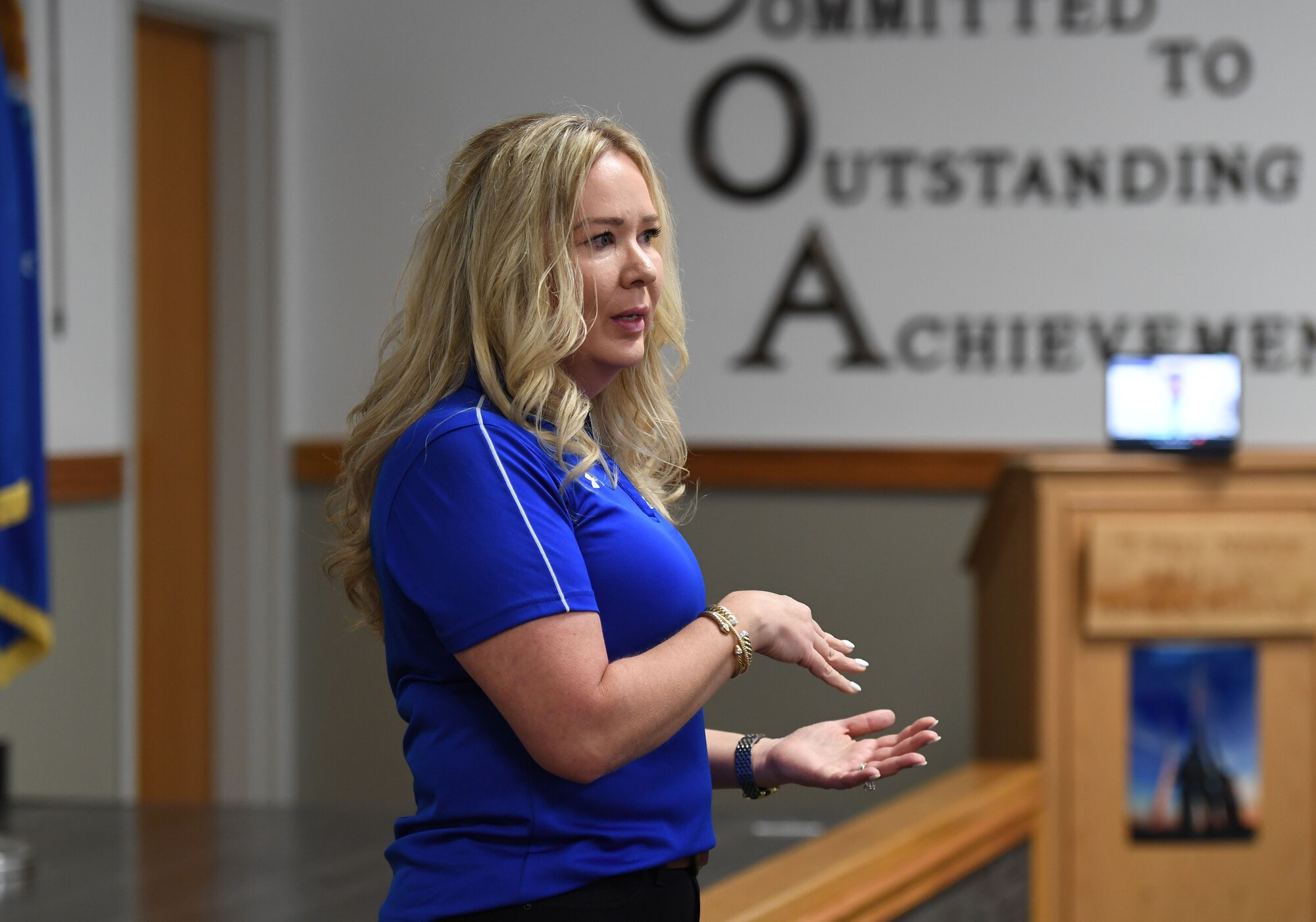 Melissa Weist, Air Force Wounded Warrior (AFW2) ambassador and program manager for outreach, gives a brief to members of the NCO Academy inside Mathies Hall at Keesler Air Force Base, Mississippi, June 7, 2022. The AFW2 program provides concentrated non-medical care and support for combat wounded, ill and injured Airmen and their families as they recover and transition back to duty or into civilian life. (U.S. Air Force photo by Kemberly Groue)