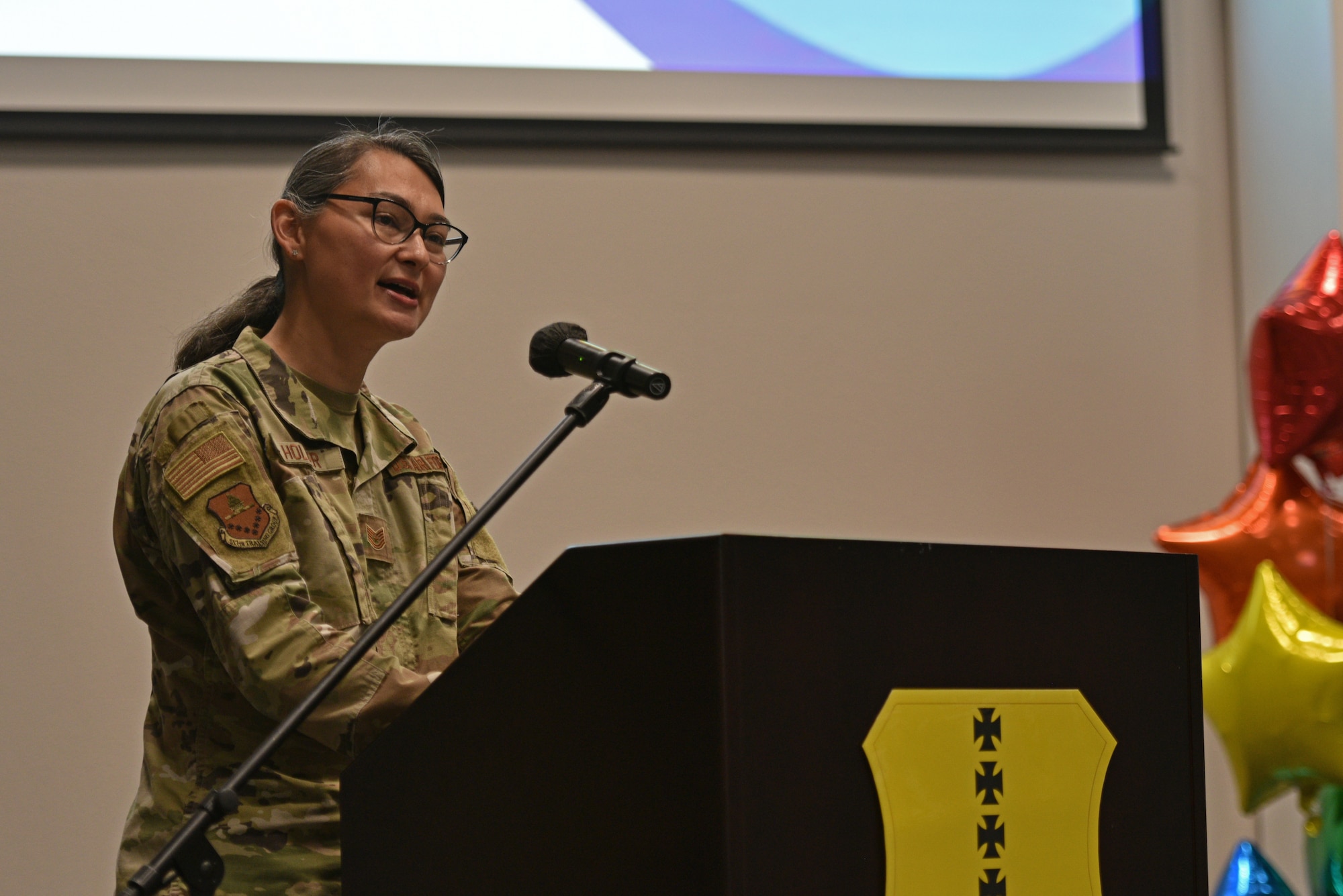 U.S. Air Force Tech. Sgt. Alexandria Holder, 517th Training Group global language mentor, speaks at the Pride Month Kickoff and Leadership Panel, Goodfellow Air Force Base, Texas, June 6, 2022. Holder spoke about her own personal journey as a transgender female serving in the military and how the ‘Don’t Ask, Don’t Tell’ ban affected her. (U.S. Air Force photo by Senior Airman Ashley Thrash)