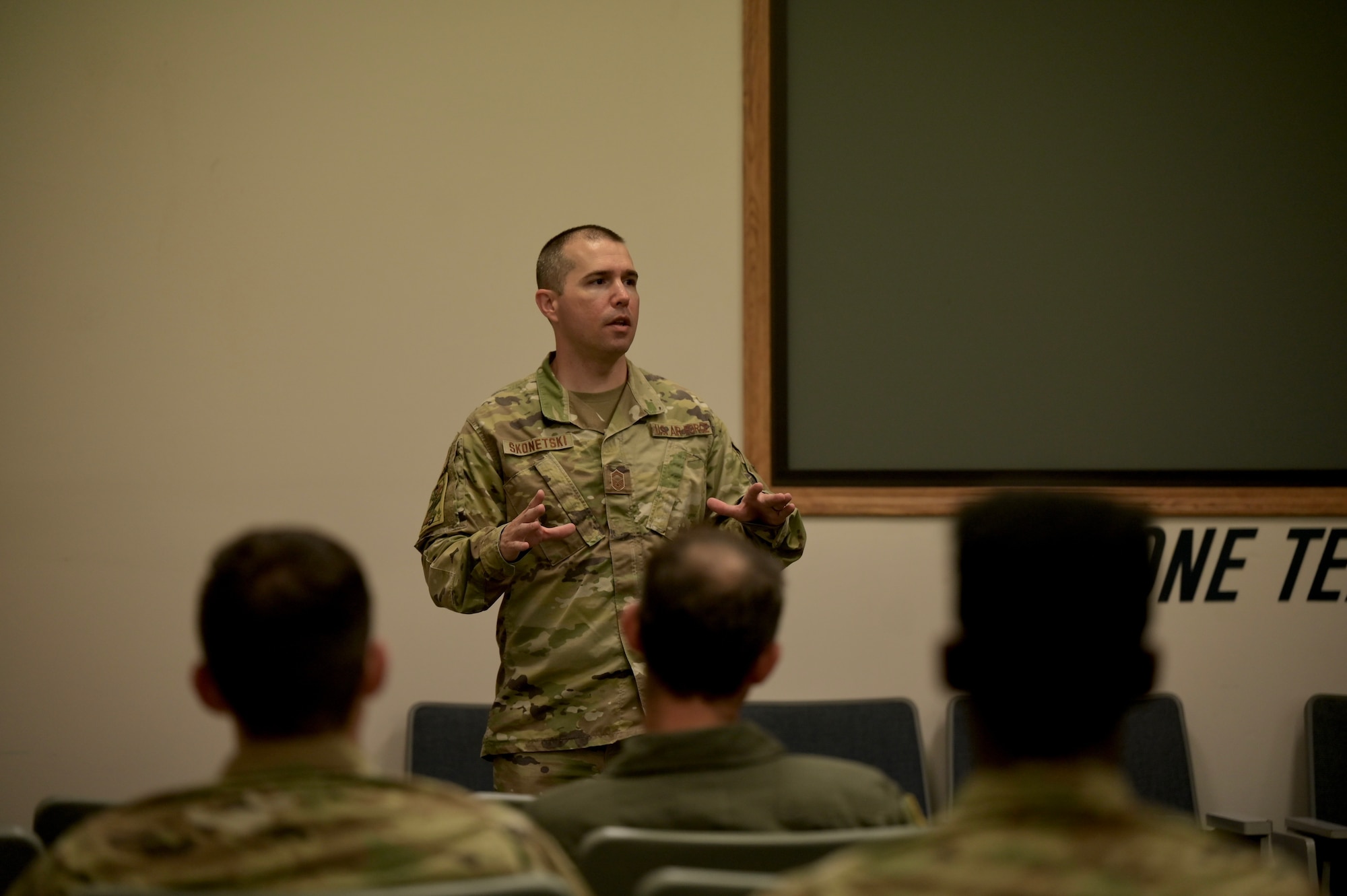 Senior Master Sgt. Michael Skonetski, 15th Wing Agile Combat Employment team, receives feedback after the completion of the initial phase of the Tier 1 Multi-Capable Airmen class at Joint Base Pearl Harbor-Hickam, Hawaii, May 18, 2022. The MCA class consisted of 35 Airmen from 25 different career fields. (U.S. Air Force photo by 1st Lt. Benjamin Aronson)