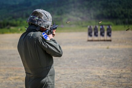 Air National Guard Brig. Gen. Anthony Stratton, Alaska Air National Guard commander, shot his M4 carbine rifle during the Commander's Cup portion of the 2022 Adjutant General's Match held at Joint Base Elmendorf-Richardson, Alaska, on June 4, 2022. The Commander's Cup concludes the week-long match and is a competition between the Army National Guard and Air National Guard commanders to score the most marksmanship points. (Alaska National Guard photo by Sgt. Royale Spann, 134th Public Affairs Detachment)