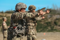 Spc. Fai Thao with 1st Battalion, 297th Infantry Regiment fires his SIG Sauer M17 handgun during the 2022 Alaska National Guard Adjutant General Match held at Joint Base Elmendorf-Richardson, Alaska, June 1, 2022. Soldiers and Airmen of the Alaska National Guard are competing in tests to become the next marksmanship champions of the annual Adjutant General’s Match. (Alaska National Guard photo by Pvt. Caleb Lawhorne, 134th Public Affairs Detachment)