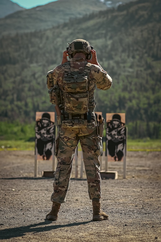 Spc. Anthony Shaw prepares to compete in the 2022 Alaska National Guard Adjutant General Match held at Joint Base Elmendorf-Richardson, Alaska, June 1, 2022. Teams of four service members competed throughout the week in a series of combat pistol and rifle marksmanship tests for a spot on the Governor’s Twenty marksmanship team. (Alaska National Guard photo by Pvt. Caleb Lawhorne, 134th Public Affairs Detachment)