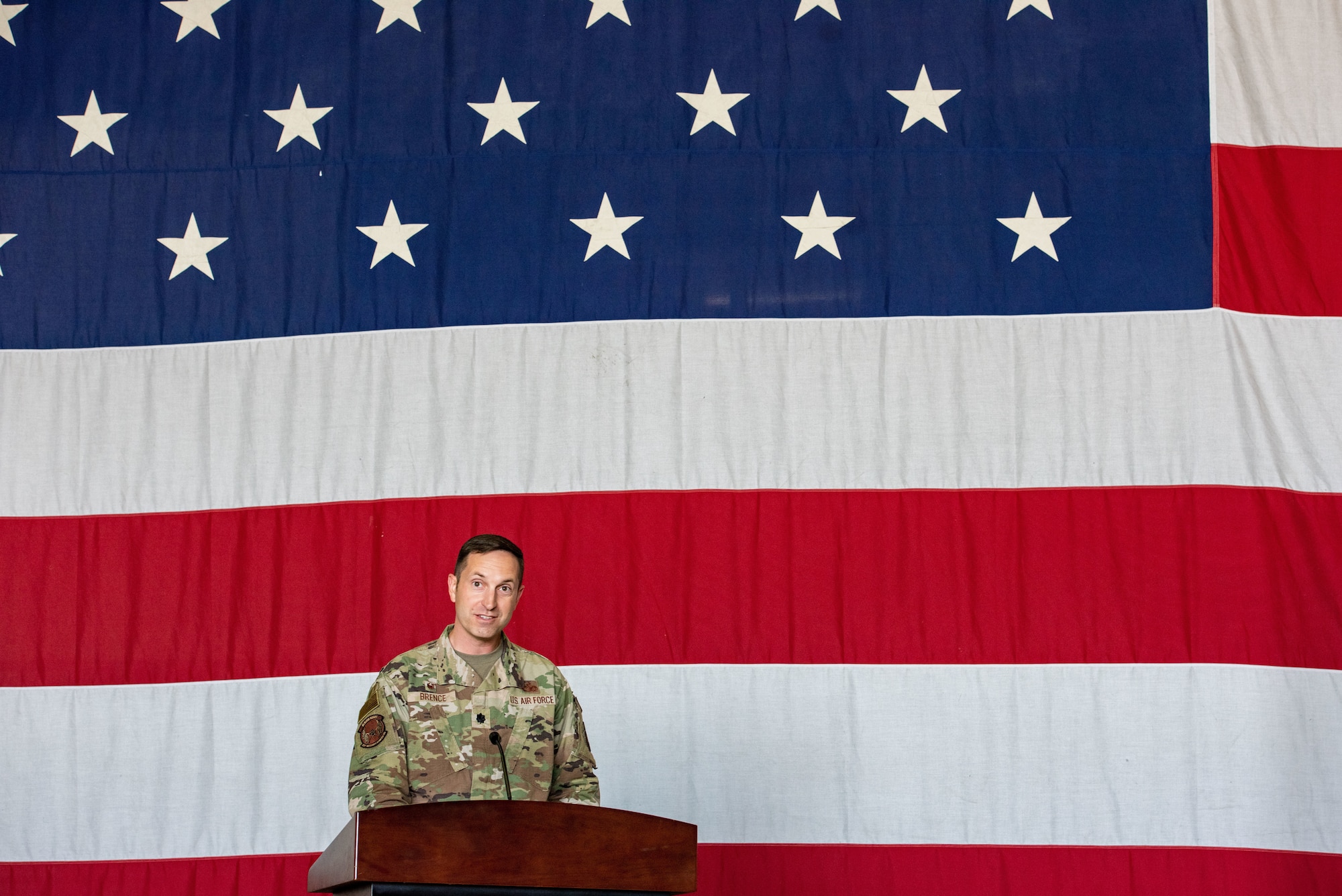 Lt. Col. Nicholas Brence, 51st Security Forces Squadron newly-appointed commander, delivers his  acceptance speech as the new 51st SFS commander