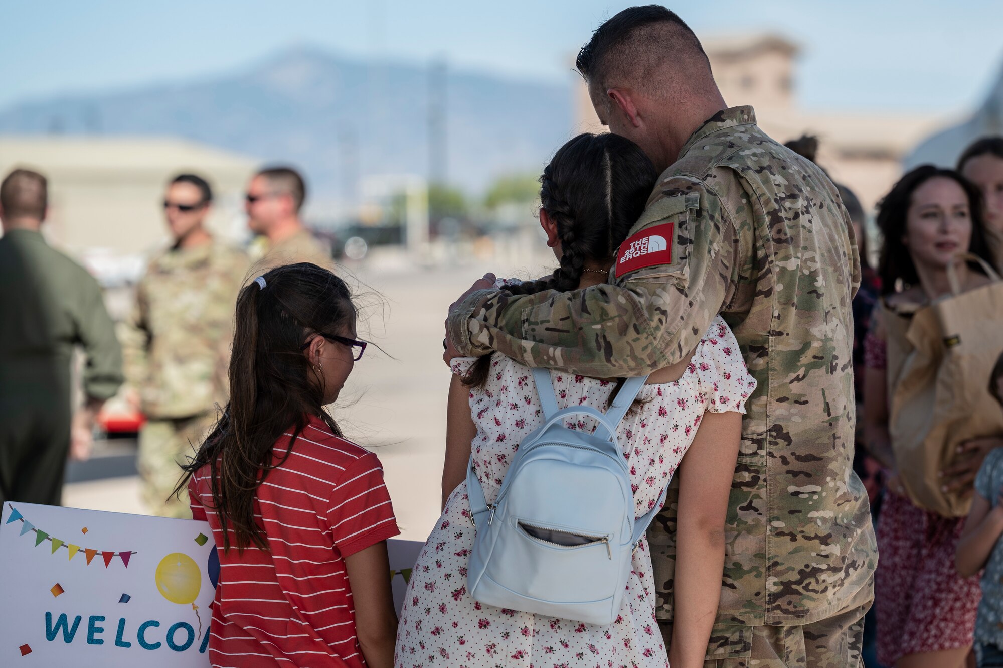 A photo of families reuniting.