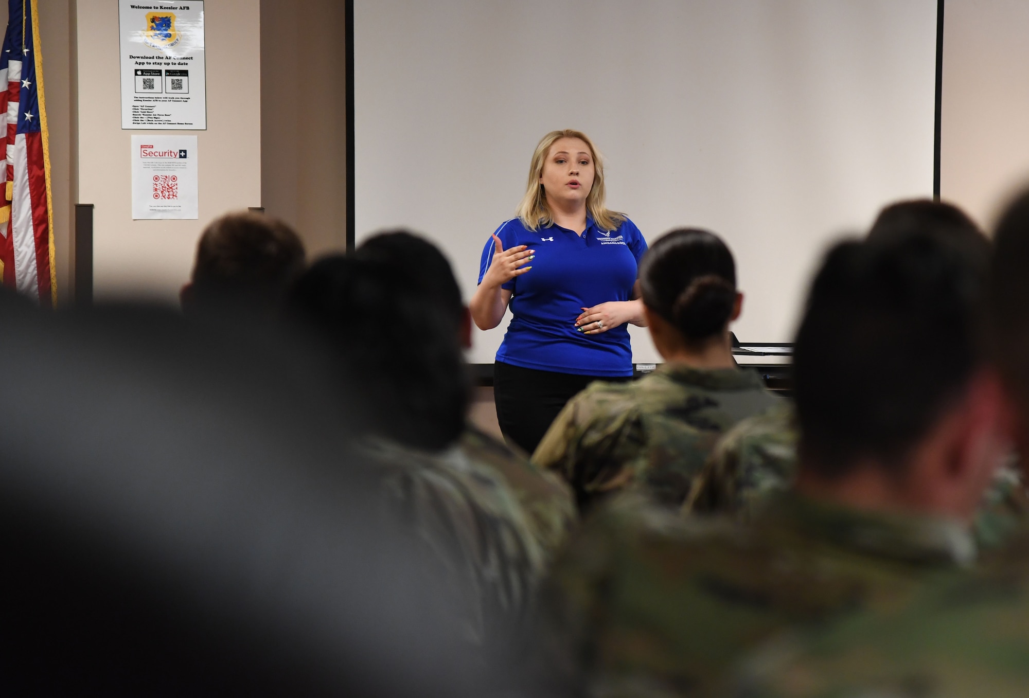Retired U.S. Air Force Staff Sgt. Laura Flood, Air Force Wounded Warrior (AFW2) program ambassador, tells her story to students from the 336th Training Squadron inside Holbrook Manor at Keesler Air Force Base, Mississippi, June 7, 2022. The AFW2 program provides concentrated non-medical care and support for combat wounded, ill and injured Airmen and their families as they recover and transition back to duty or into civilian life. (U.S. Air Force photo by Kemberly Groue)