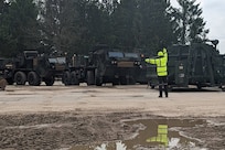 Personnel from the 405th Army Field Support Brigade’s Mannheim and Benelux battalions conduct equipment turn-in operations at an Equipment Configuration Hand-off Area in Branwieo, Poland, with the 74th Multi-Role Bridge Company, deployed from Fort Hood, Texas, to Poland for DEFENDER-Europe 22. Following their successful participation in DEFENDER-Europe 22, the 74th MRBC turned the Army Prepositioned Stocks-2 equipment set back over to the 405th AFSB. The coordinated issue and follow-up return, reception and inventory of thousands of vehicles and equipment pieces between the 405th AFSB and multiple U.S.-based units deployed to Europe for DEFENDER-Europe 22 successfully demonstrates the viability of the Army Prepositioned Stocks-2 program in Europe. (photo by LaShaun Chappell)