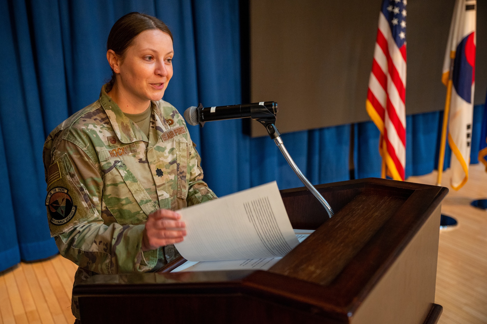 Lt. Col. Nessa Hock, 607th Combat Weather Squadron (CWS) commander, gives her acceptance speech after assuming command of the 607th CWS