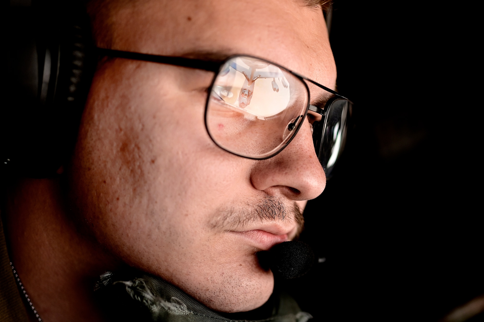 U.S. Air Force Airman 1st Class Kaleb Brewer, KC-135 Stratotanker aerial refueling specialist assigned to the 350th Expeditionary Air Refueling Squadron, conducts refueling operations with a U.S. Air Force B-52 Stratofortress, assigned to the 5th Bomb Wing, during a presence patrol mission with coalition and regional partners within the U.S. Central Command area of responsibility, June 8, 2022. Presence patrol missions demonstrate the U.S.-led coalition's commitment to promoting regional stability. (U.S. Air Force photo by Master Sgt. Matthew Plew)