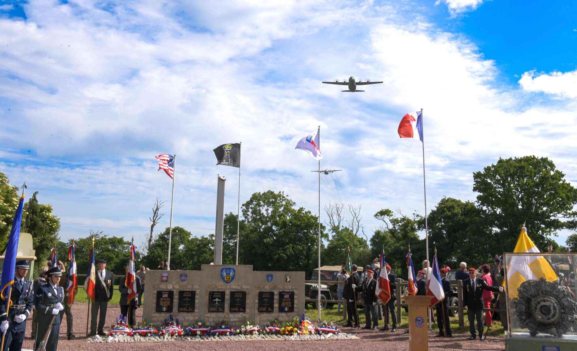 Two C-130J Super Hercules aircraft from the 37th Airlift Squadron out of Ramstein Air Base, Germany, flew over the Airborne Memorial Ceremony at Picauville, France, June 2, 2022. The ceremony paid tribute to the soldiers who lost their lives when five C-47’s crashed on this communal territory. (U.S. Air Force photo by Airman 1st Class Lauren Jacoby)