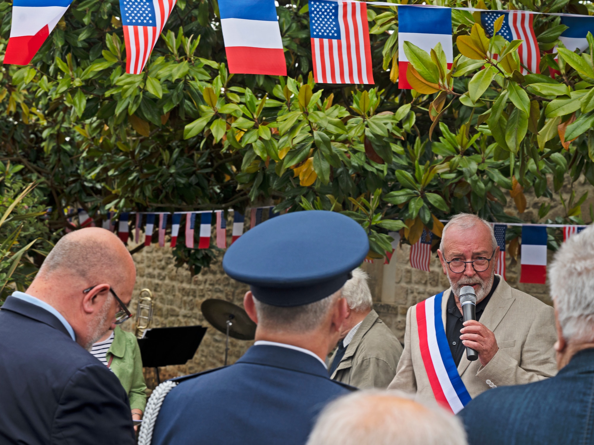 Guy Ledenechal, the Mayor of Negreville, France, gives a speech during a D-Day ceremony June 3, 2022. Negreville has hosted a D-Day ceremony every year since 1999 to commemorate those who gave their lives to free France during the Normandy landings on June 6, 1944. (U.S. Air Force photo by Senior Airman Thomas Karol)